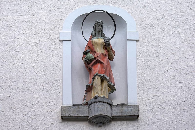 Sculpture of Saint Verena at the church of the same name, Fischen, Allgäu, Bavaria, Germany
