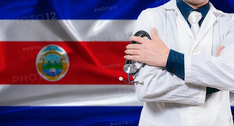 Costa Rican national health system, Medical professional holding sthetoscope isolated