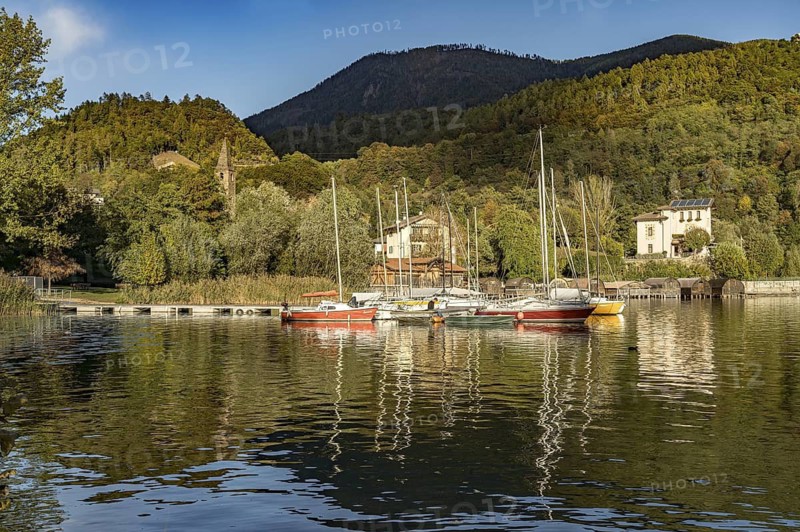 Sailing boats on Lake Caldonazzo in Valsugana near San Cristoforo, Trentino, Italy