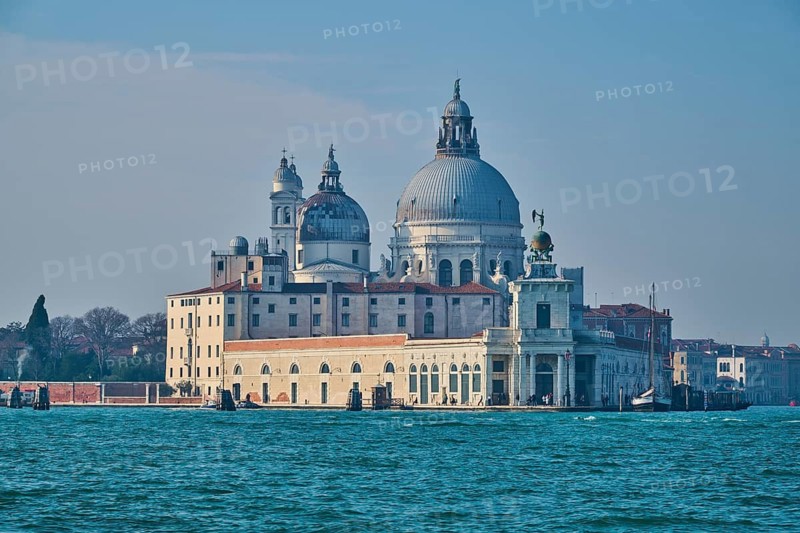 View from the water on church 'Basilica di Santa Maria della Salute' in Venice on a sunny day in winter, Italy