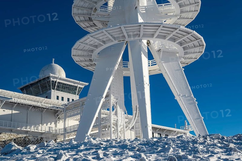 Lower part of the telecommunications tower on the Brocken summit, radar station in the background, winter, Harz National Park, Saxony-Anhalt, Germany