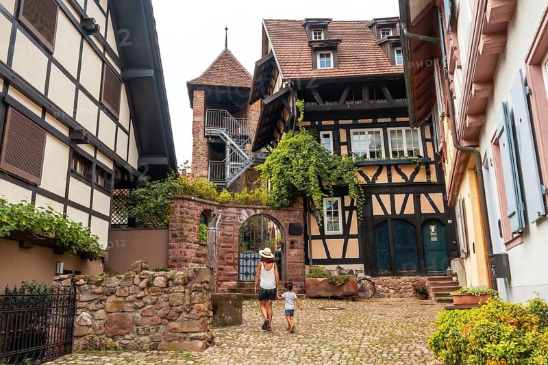 Mother and son in the old town of Gengenbach in the Black Forest, Germany, family vacation concept