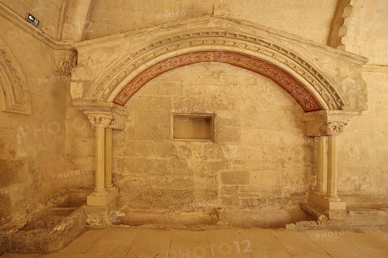 Interior view with archway of the Romanesque monastery church Abbaye de Montmajour, Benedictine monastery, Arles, Bouches-du-Rhône, Camargue, Provence, France