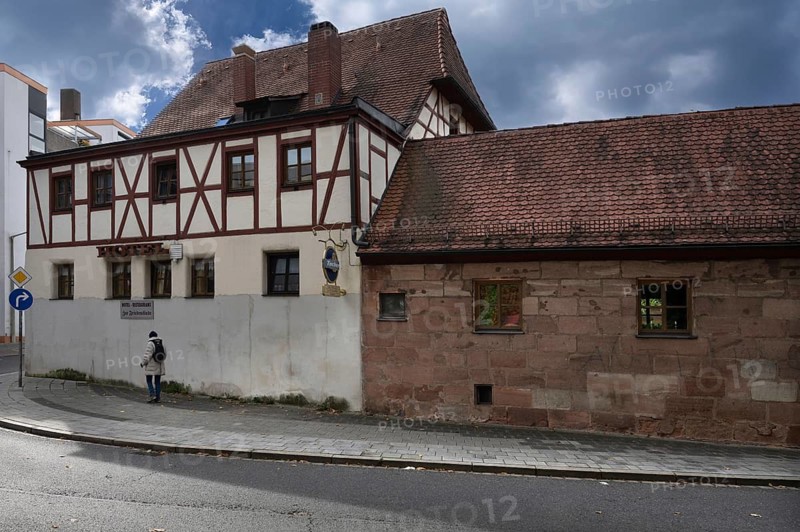 Former inn Zur Friedenslinde, core 17, 18th century, inscribed 1764, Mögeldorfer Hauptstraße 63, Mögeldorf, Middle Franconia, Bavaria, Germany