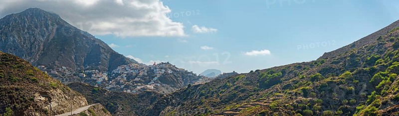Picturesque village of Olymbos in the middle of a mountainous landscape with picturesque valleys and clear skies, Olymbos, Karpathos, Greece