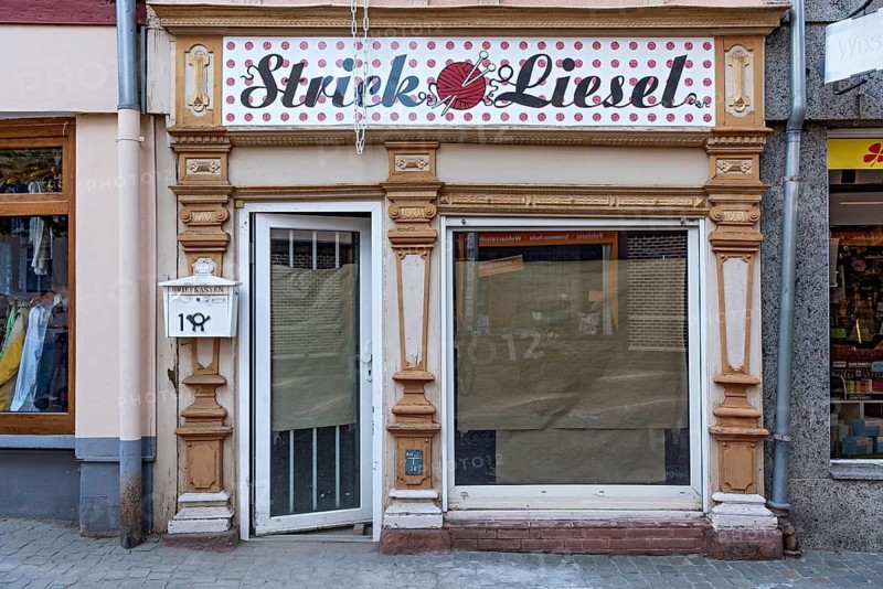 Shop for wool, knitwear Liesel, old shop in renovation, shop front of the Wilhelminian period made of wood, historicism, pedestrian zone, historic old town, Butzbach, Wetterau, Hesse, Germany