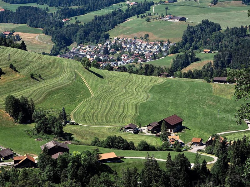 A village nestled between gently rolling hills and well-kept fields, Hüttchopf, Tösstal, Canton of Zurich, Switzerland