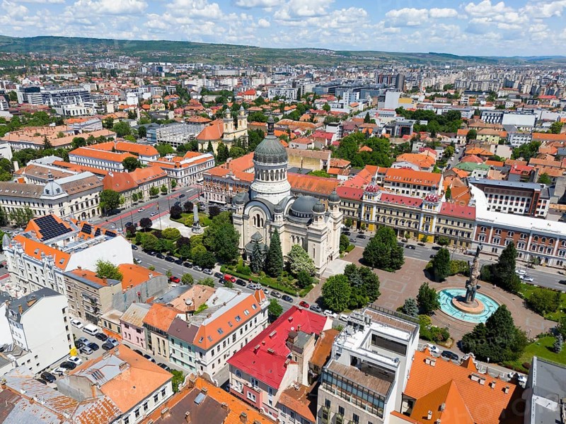 City panorama with a domed church and surrounding area, including a park and red roofs, aerial view, Metropolitan Cathedral of the Assumption of Mary, Cluj-Napoca, Cluj, Transylvania, Transylvania region, Romania