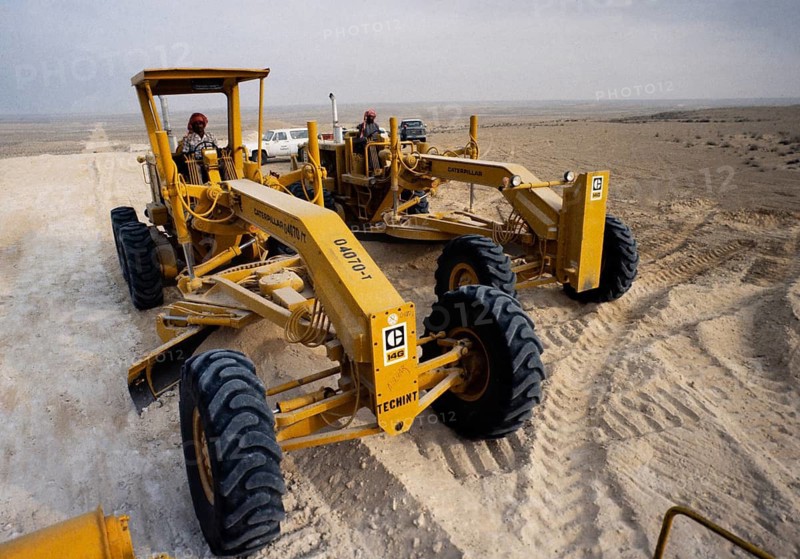 Oil industry in the Ras Tanura area, Saudi Arabia, 14G Tracked vehicles in desert construction 1979