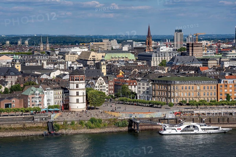 Skyline of Düsseldorf, banks of the old town on the Rhine, view over the houses on the old town promenade to district 1, city center, barges on the Rhine, North Rhine-Westphalia, Germany