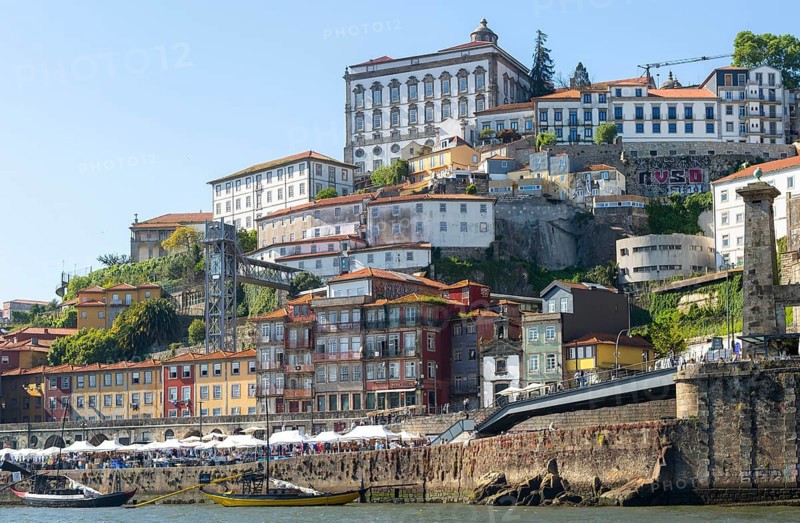 Historic riverside buildings on hillside of Ribeira next to River Douro, Porto, Portugal, Europe view to cathedral