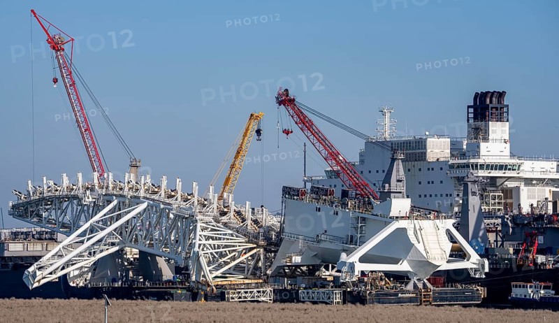 Bumblebee barge, with the Stinger boom, which is part of the world's largest laying vessel for deep-sea pipelines, the Pioneering Spirit, and the assembly in front of large plants in the sea, the pipes are released into the deep sea via the device, is owned by the Allseas Company from Switzerland, the Netherlands, in the seaport of Rotterdam, Maasvlakte, Rotterdam Netherlands