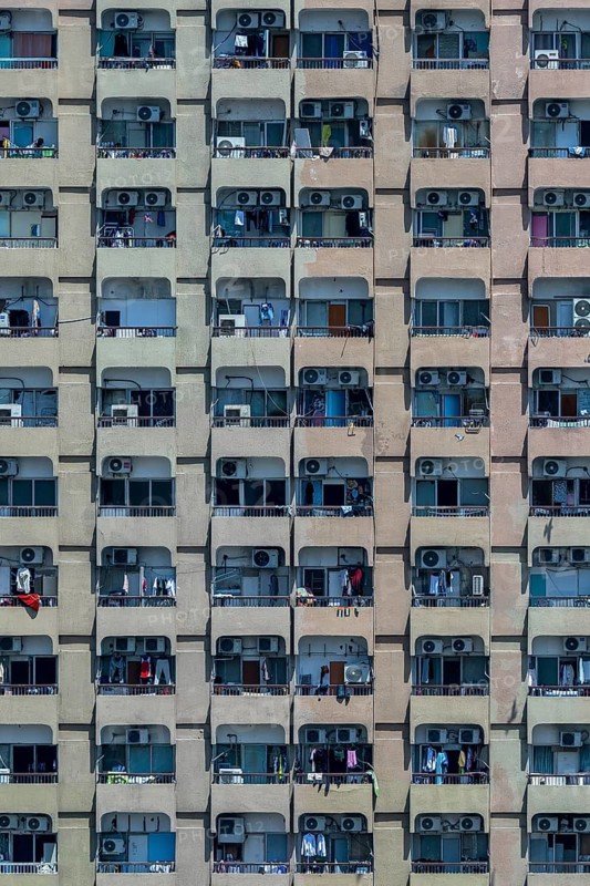 Apartment block with balconies and air-conditioning units, Dubai, United Arab Emirates, UAE