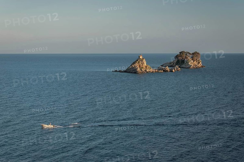 Boat on the Adriatic Sea and Islands Sveta Nedjelja and Katic in Montenegro