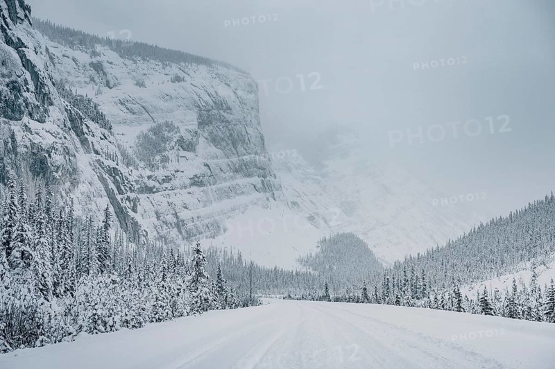 Winter road trip on the Icefields Parkway with lots of snow and ice, Banff National Park, Jasper National Park, Alberta, Canada