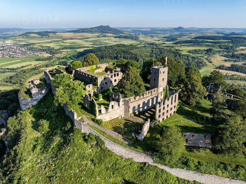 Aerial view of the volcanic cone Hohentwiel with Germany's largest fortress ruins, on the horizon the Hohenstoffeln and Hohenhewen, district of Constance, Baden-Württemberg, Germany