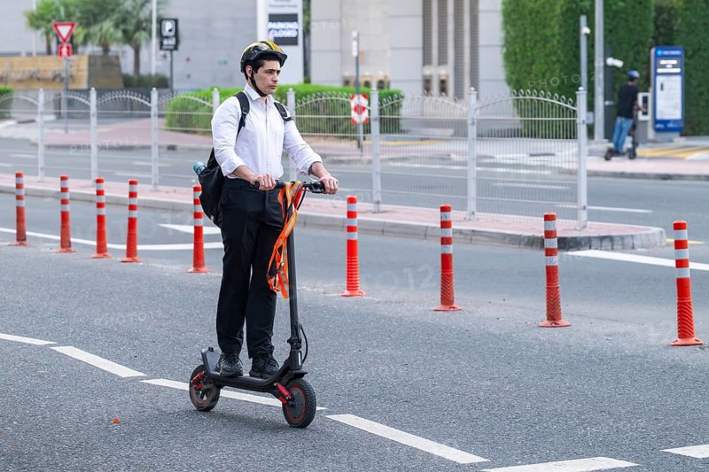 Man with e-scooter, Dubai, United Arab Emirates, UAE