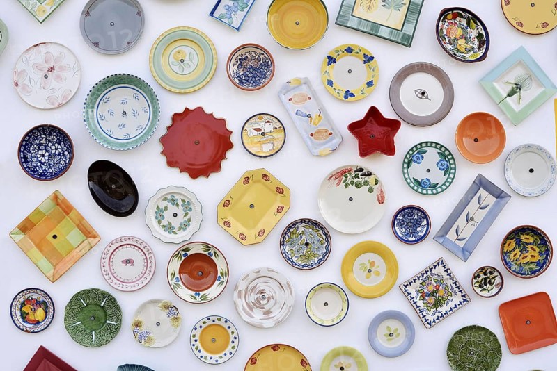 House wall with traditionally painted ceramic plates, Vila do Bispo, Algarve, Portugal