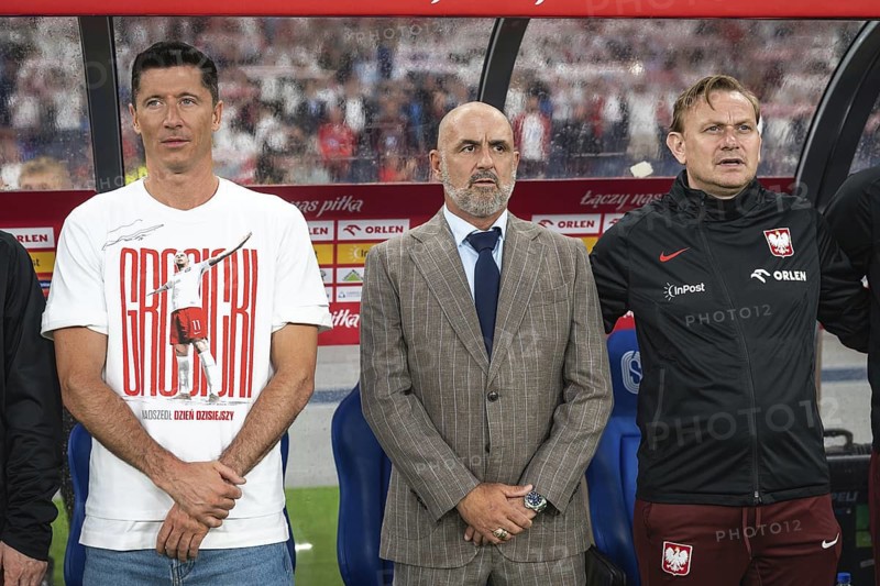 CHORZOW, POLAND - JUNE 6, 2025: Friendly match Poland - Moldova. Robert Lewandowski (L) (t-shirt with Kamil Grosicki) coach Michal Probierz and coach assistant Sebastian Mila (R)