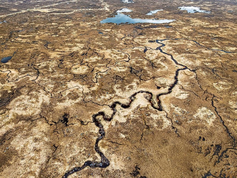 Top Down over Rannoch Moor from a drone, Loch Ba and Loch of the Armpit, A82 Highland Way, Argyll and Bute, West Highlands, Scotland, United Kingdom