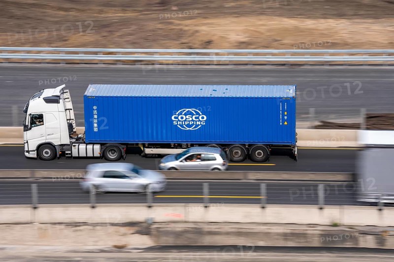 Container truck on the highway, Cosco Shipping
