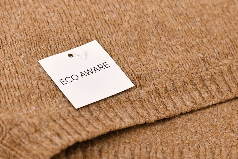 Eco aware label attached to environmental friendly produced pullover