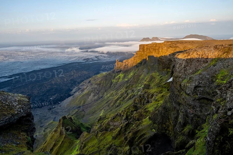 Cliff in the evening light, Impressive landscape with mountains and glaciers, Huldujökull and Kötlujökull glacier tongues, Myrdalsjökull glacier, Pakgil, Iceland