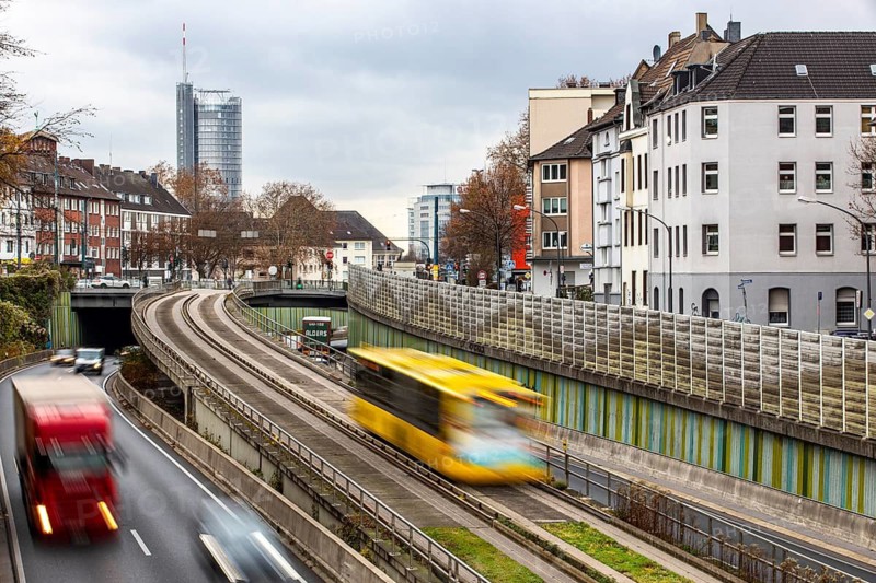 Motorway A40, Ruhrschnellweg, skyline of the city centre of Essen, exit Essen-Huttrop, track bus route, this area would also be affected by a diesel driving ban, Essen, North Rhine-Westphalia, Germany