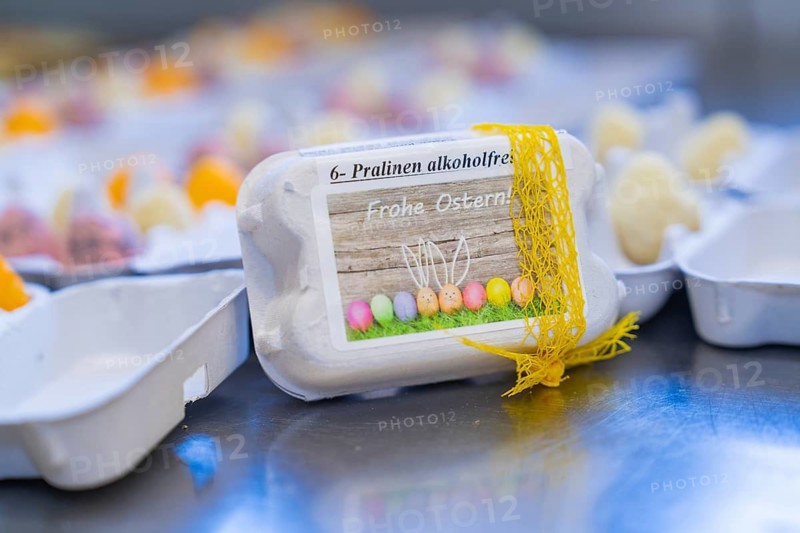 Wrapped Easter egg chocolates with colourful decoration and Easter theme, Easter baking and chocolate icing at Haselstaller Hof, Gechingen, Black Forest, Germany