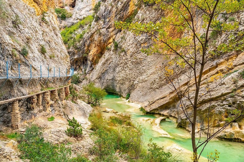 Metal walkways of the path next to the Vero River in Alquezar. Pyrenees