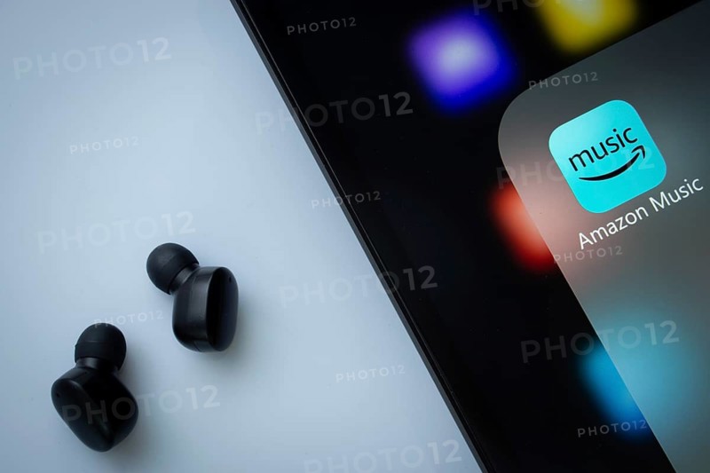 A close up of an iPad screen displaying the amazon music app