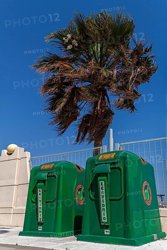 Green environmental containers at the roadside, Rota, Andalusia, Spain