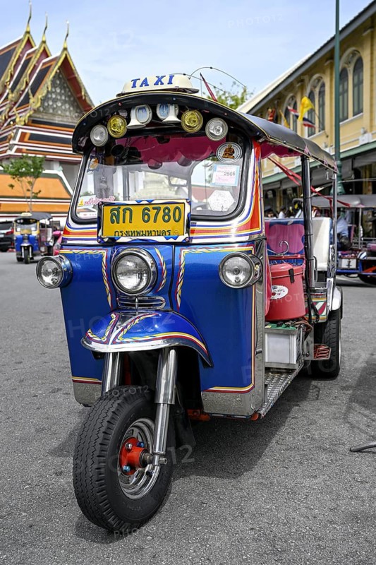 Tuktuk taxi in front of Wat Pho, Temple of the Reclining Buddha, Bangkok, Thailand