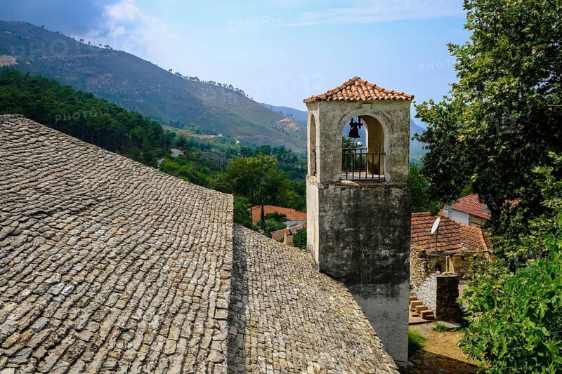 Megalo Kazaviti, Thassos, Greece - Tower of the Church of the Apostles in Kazaviti. The mountain village of Kazaviti with its traditional houses is a popular destination for holidaymakers. Thassos belongs to Eastern Macedonia and Thrace, also East Macedonia and Thrace