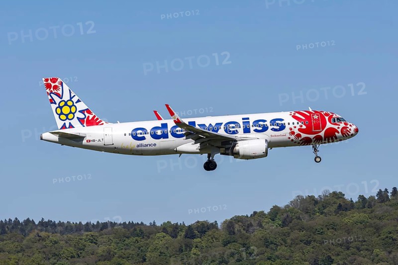 An Edelweiss Airbus A320 aircraft with the HB-JLT license plate and the Help Alliance special livery at Zurich Airport, Switzerland