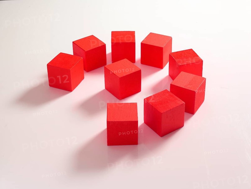 9 red wooden cubes against a white background