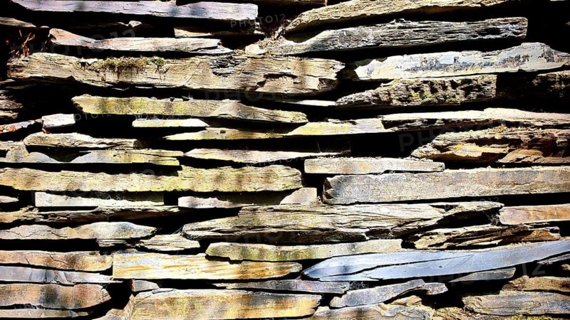Close-up of a stone wall stacked from slate plates, Lehesten slate park, Rennsteig, Thuringian Highlands Obere Saale nature park Park