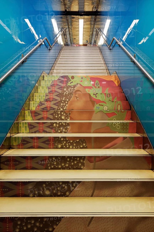 Futuristically designed Università metro station, steps with portrait of Dante Alighieri art subway, Metrò dell' Arte, Naples, Campania, Italy