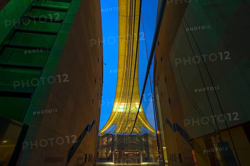 Reflection in the façade of the State Museum of Art and Design at dusk, Nuremberg, Middle Franconia, Bavaria, Germany