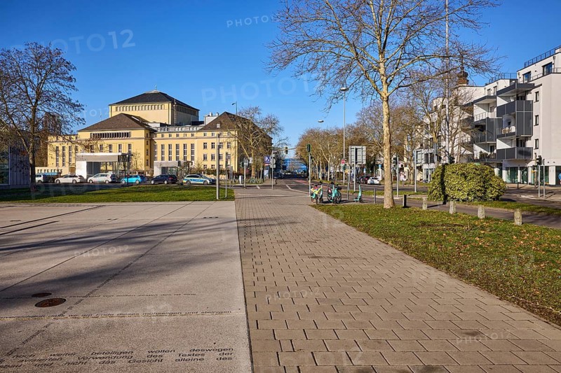 Saarland State Theatre, general architecture, pavement, pavement of concrete paving stones, trees, meadow, blue sky, cloudless, intersection Bismarckstraße with Schillerplatz, Saarbrücken, state capital, regional association Saarbrücken, Saarland, Germany