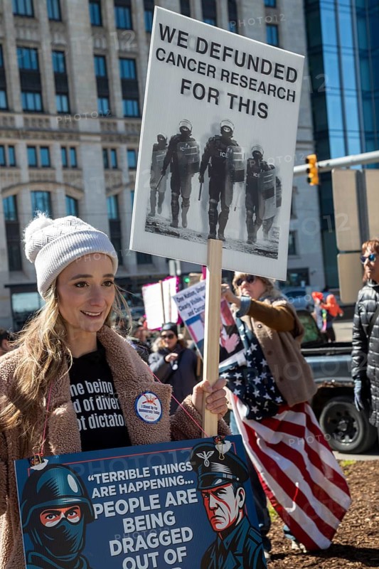 Detroit, Michigan USA - 28 March 2026 - People gathered at more than 100 'No Kings' rallies across Michigan. They were fighting to preserve democratic institutions, and protesting President Trump's actions against immigrants and getting the U.S. into a new foreign war