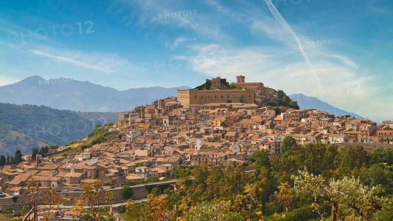 View of the town, castle on hill, sky exchanged, Montalbano Elicona, town, Nebrodi National Park, Sicily, Italy