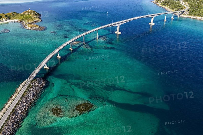 Sommaroy Bridge connecting Kvaloya Island to Sommaroy Island, small islands, turquoise water, aerial view, Norway
