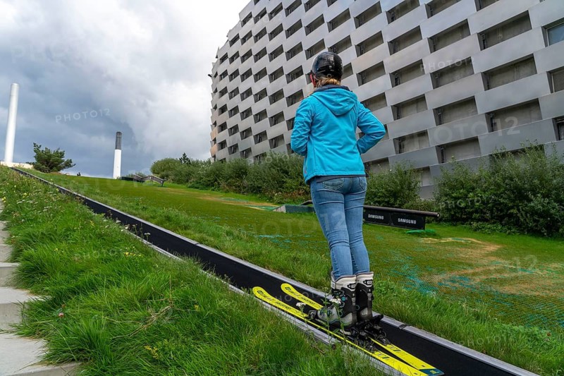 CopenHill, waste incineration plant and artificial ski slope, skiing with a view of the ski lift, 90 metres high and 400 metres long slope on artificial turf, Copenhagen, Denmark