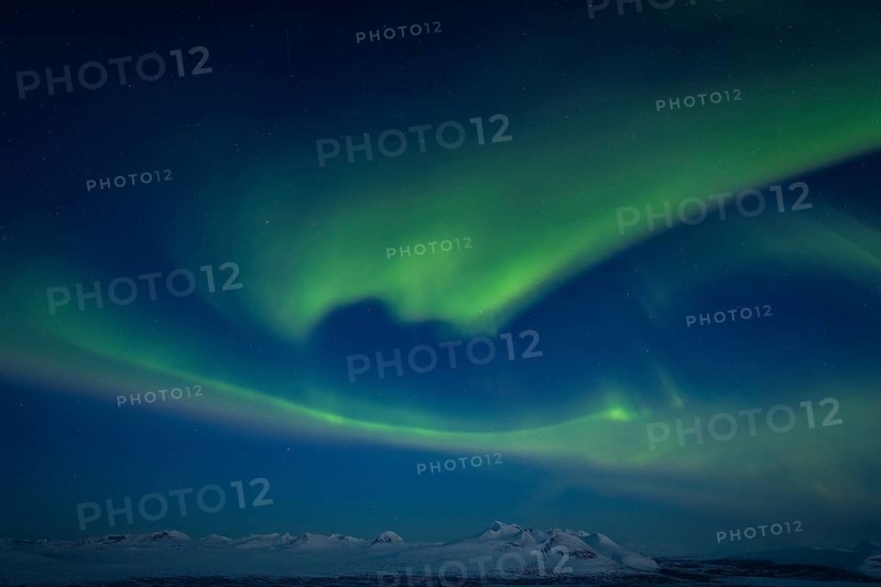 Northern Lights (Aurora borealis) over peaks in Sarek National Park and the Acre Massif, Stora Sjöfallet National Park, Laponia World Heritage Site, Norrbotten, Lapland, Sweden, April 2021