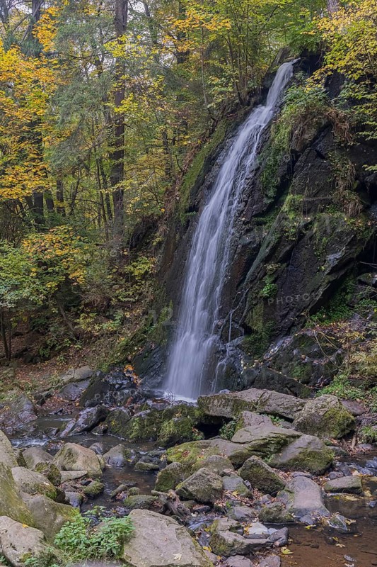 Waterfall in early autumn. Scenic park Terezino udolí (Tercino údolí or Tereziino) located in the valley of the river Strobnitz near the town of Nove Hrady in southern Czech Republic. Built in 1756