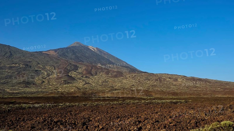 Barren volcanic landscape stretches under cloudless sky, Teide, Parque Nacional del Teide, Teide National Park, volcano, volcanism, UNESCO World Heritage Site, Tenerife, Canary Islands, Spain