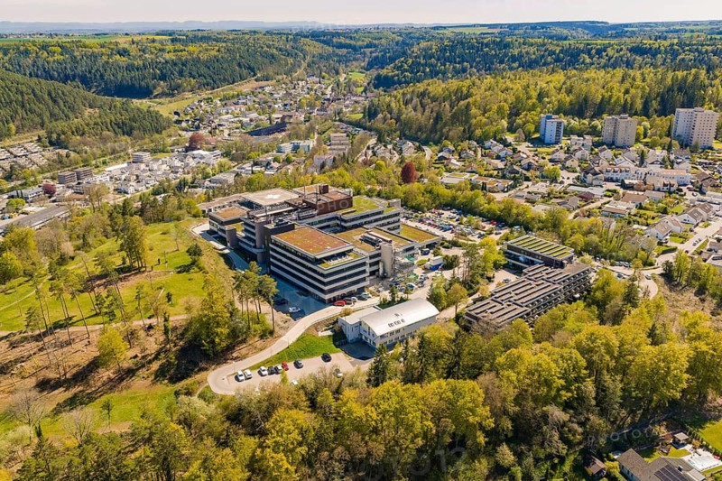 Modern hospital complex nestled in green countryside, surrounded by a small town, Nagold Hospital of the Southwest Clinic Network, Calw District, Germany