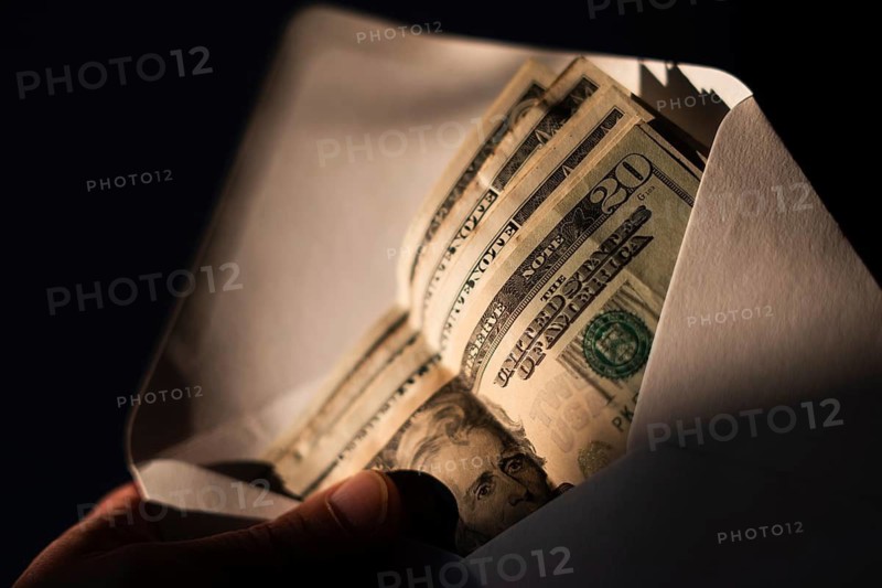 American dollars, banknotes in a white envelope in Poland