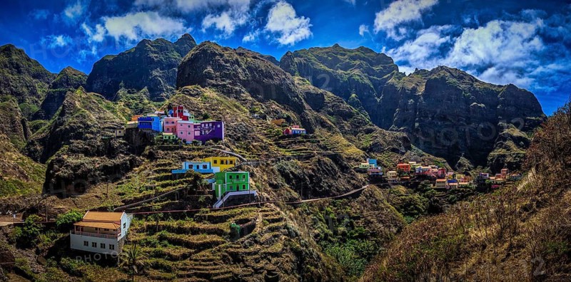 Panoramic view, small settlement, colorful village, picturesque nestled in raw, dramatic mountains under blue skies, spectacular hiking, natural heritage, cultural heritage, terraces in Fontainhas, Santo Antao, Cabo Verde, Cape Verde, Cape Verde, Cape Verde